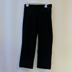 Black Lululemon leggings with slit.